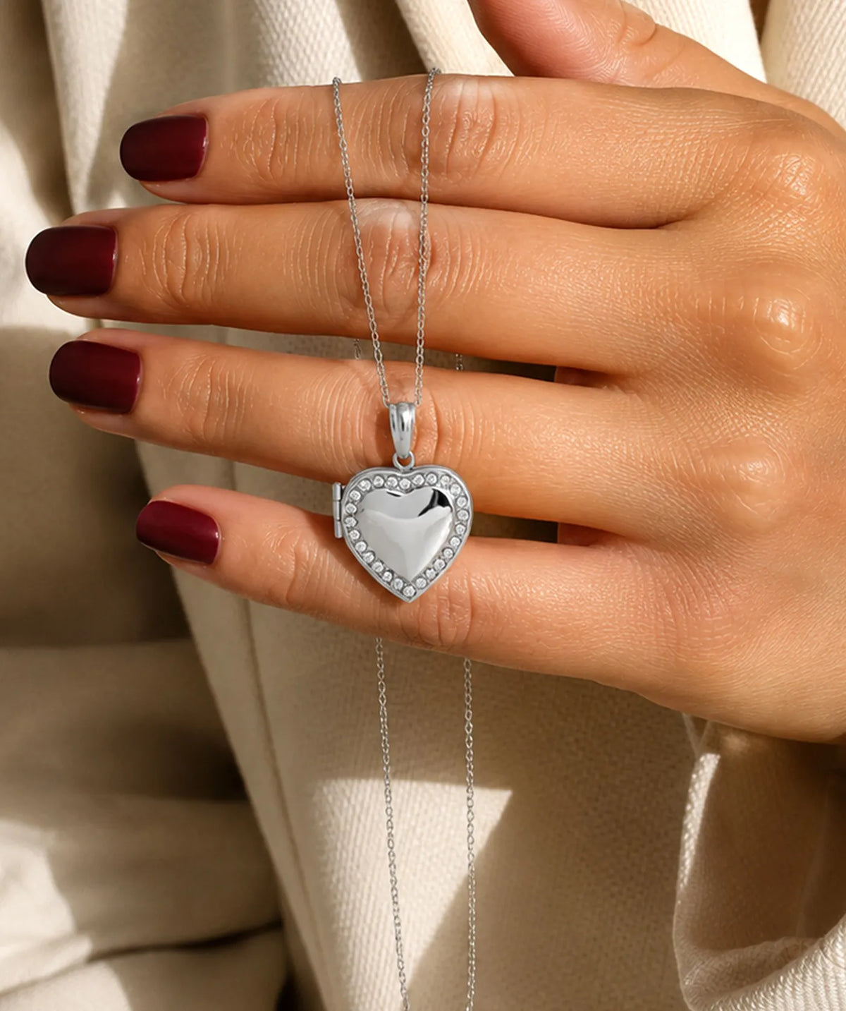 Model wearing the Silver Heart Photo Locket Necklace around the neck