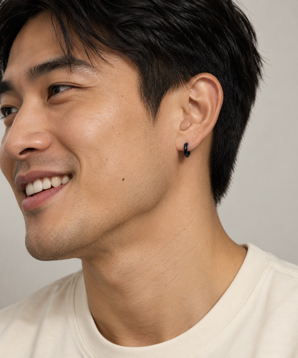 Black Round Sleeper Hoop Earrings on model