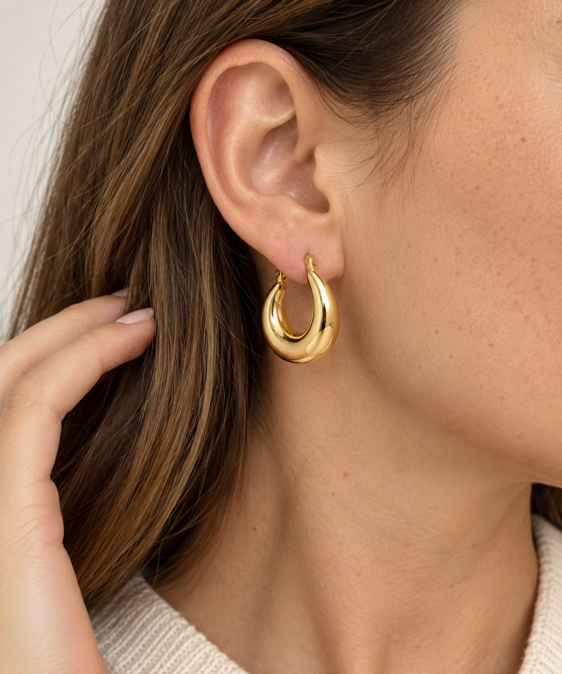 Chunky Oval Hoop Earrings on model