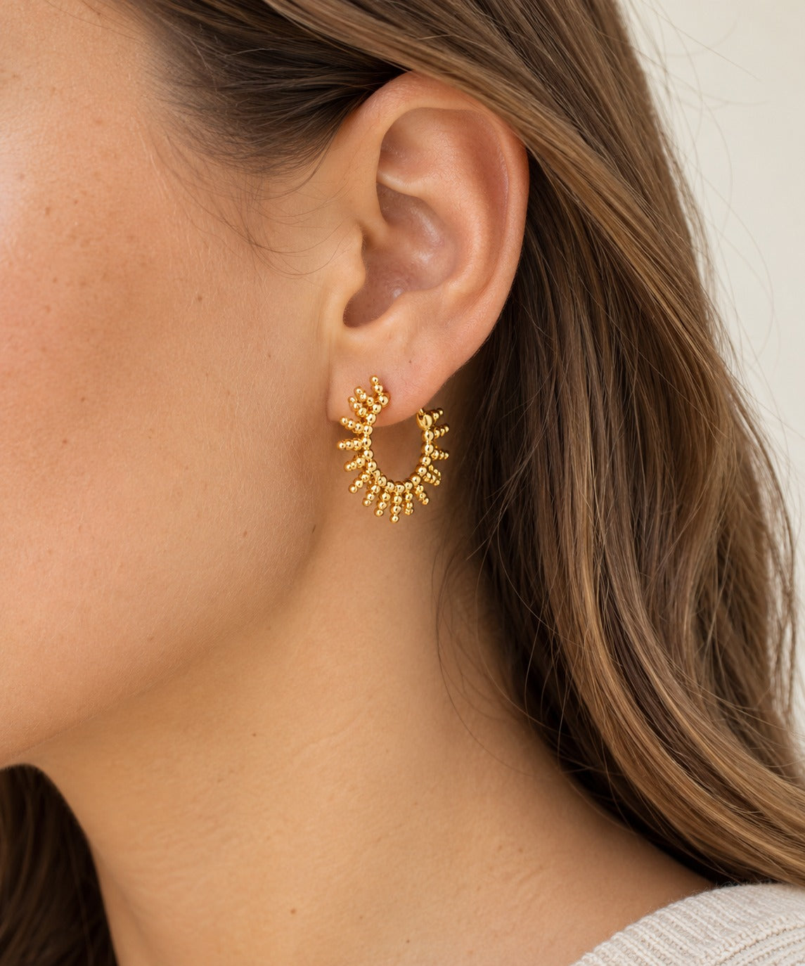 Star Sun Earrings on model