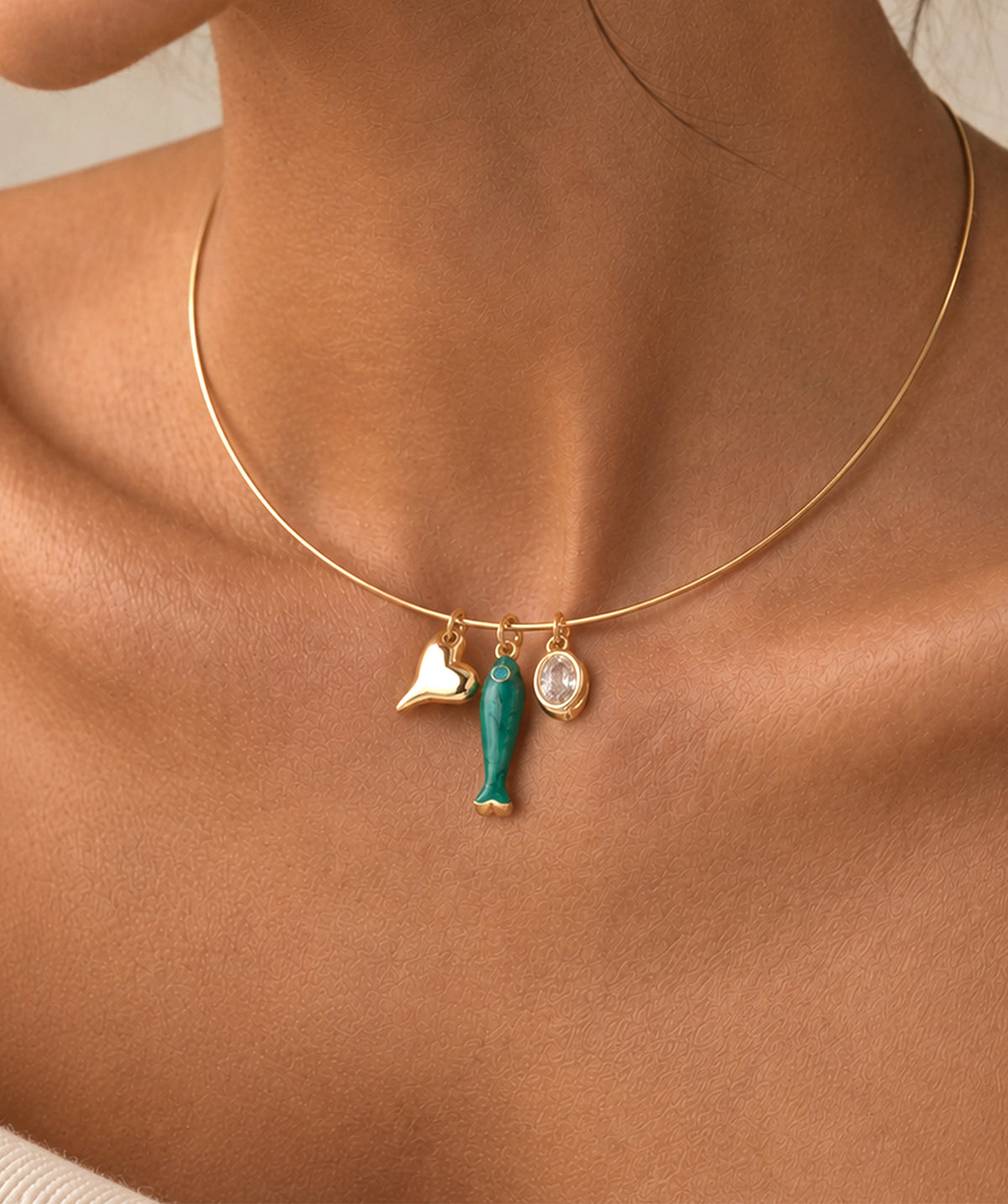 Model wearing the Gold Wire Pendant Necklace around the neck