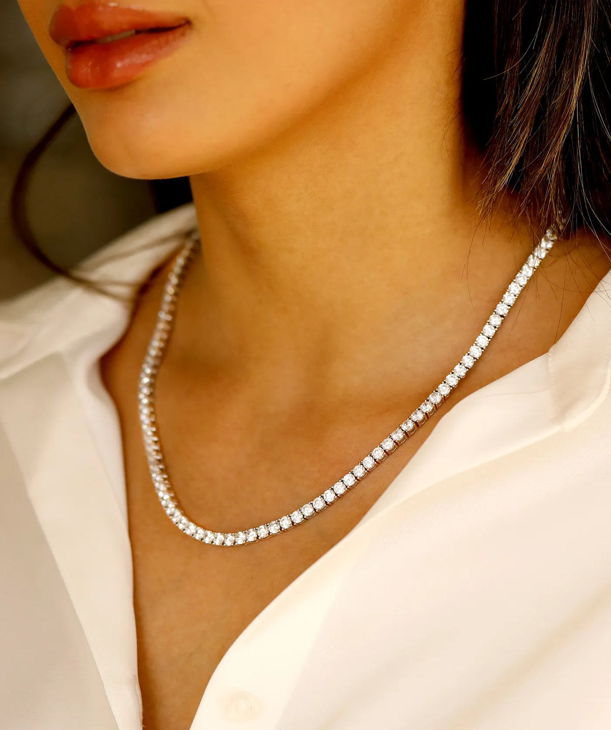 Model wearing the Tennis Necklace around the neck