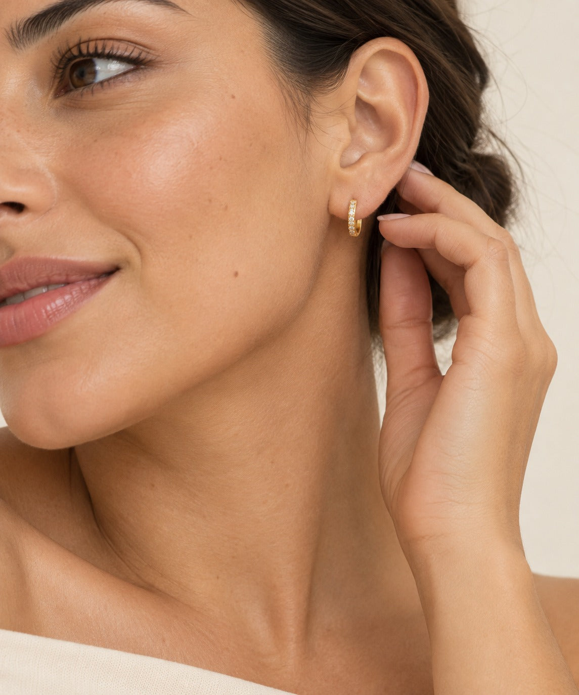 Gold Pave Huggie Earrings on model