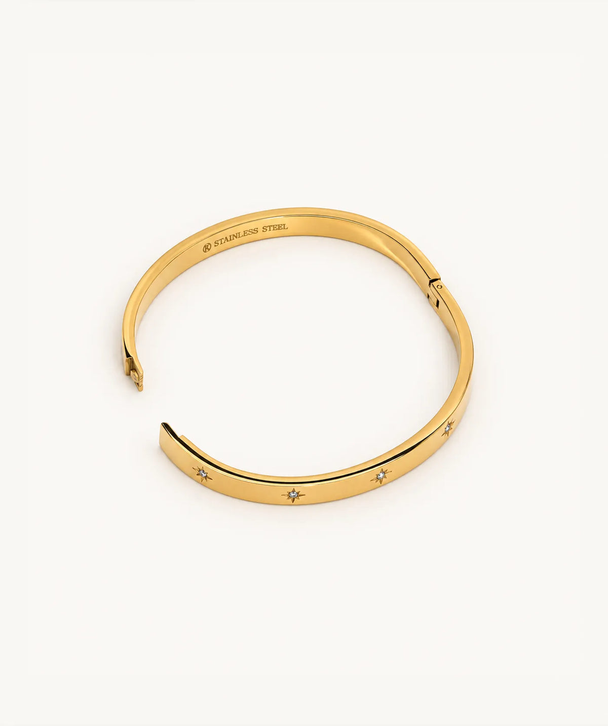 Gold Stardust Bangle, shown open