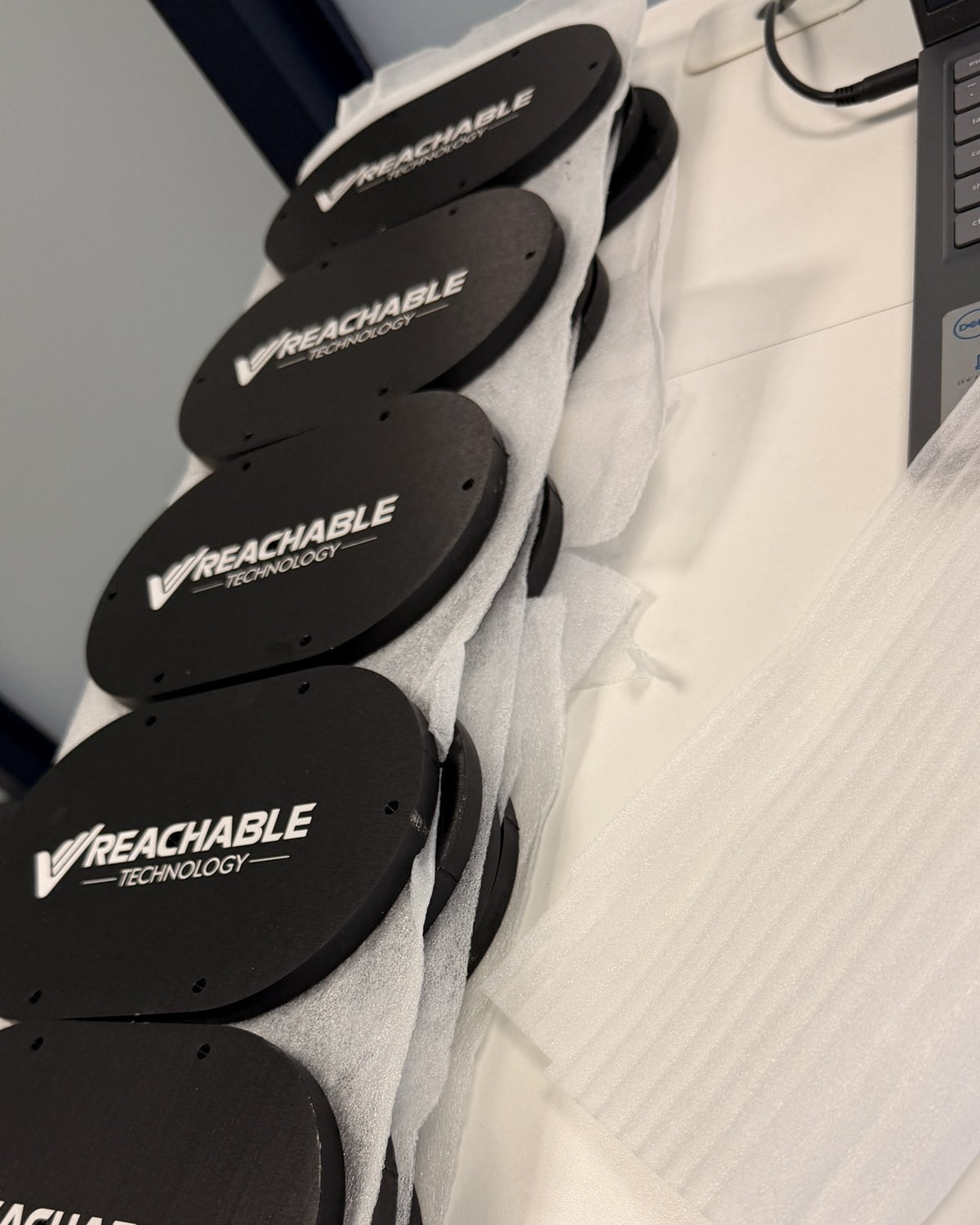 Black anodized aluminum plates laser marked with a company logo