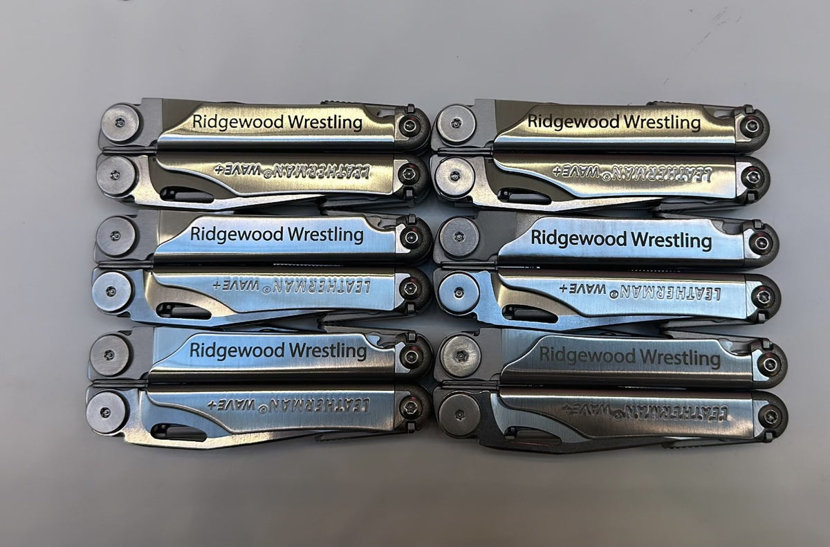 Bulk order of multitools engraved with a wrestling club name