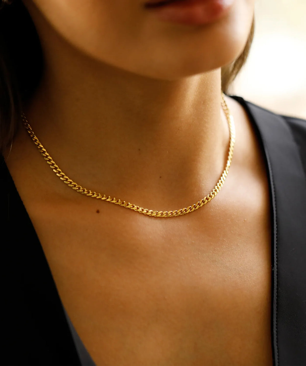 Model wearing the Gold Curb Chain around the neck