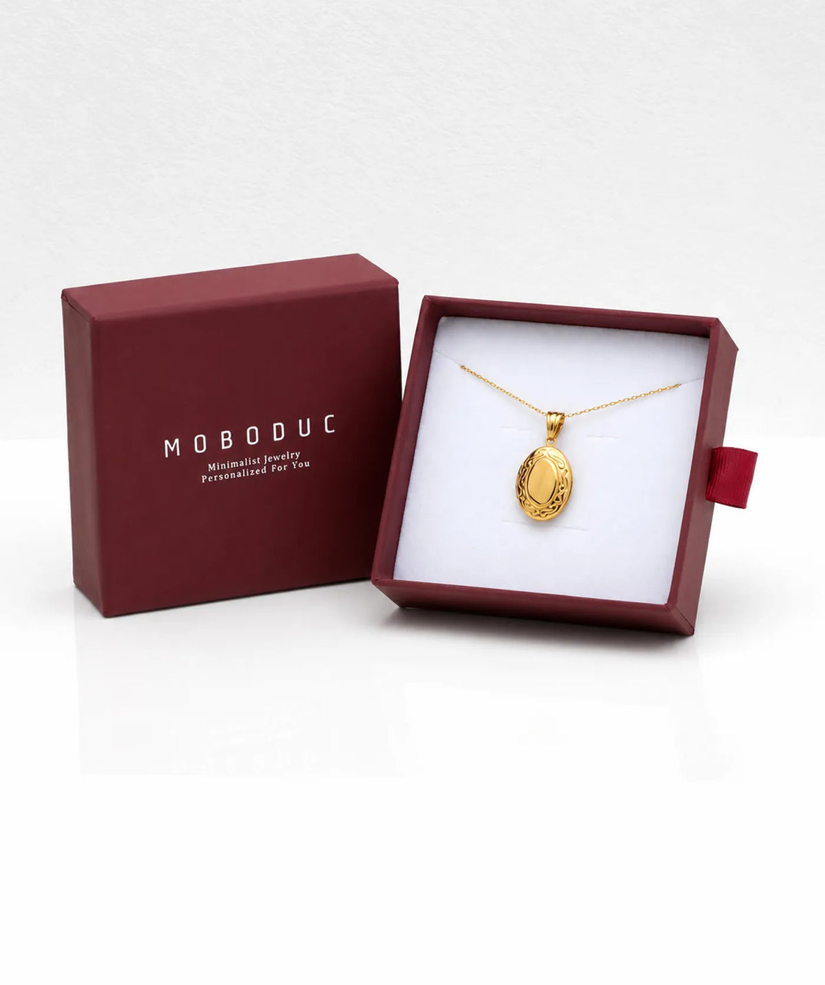 Gold Oval Photo Locket Necklace in a Moboduc gift box