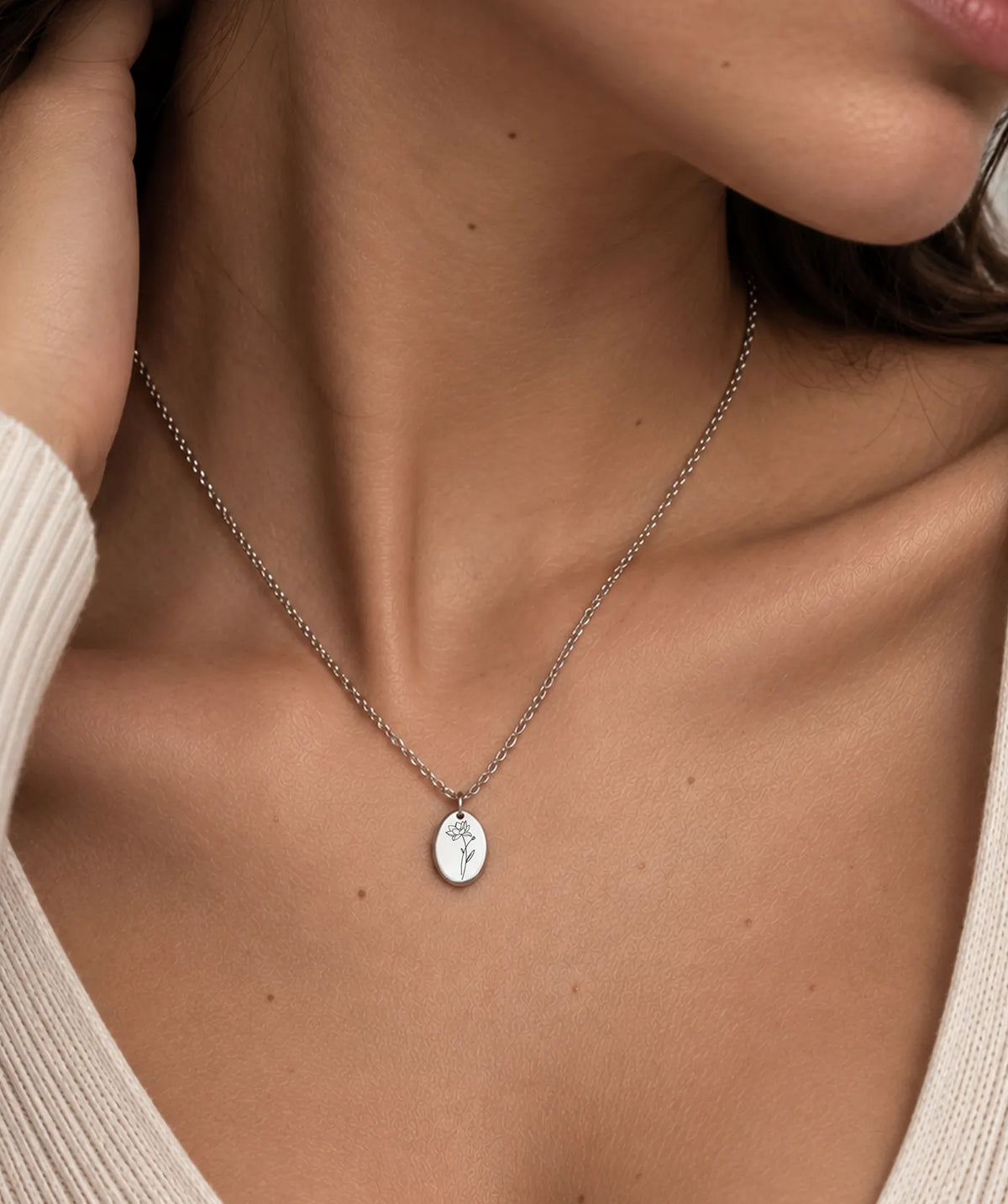 Model wearing the Silver Gold Ellipse Necklace around the neck