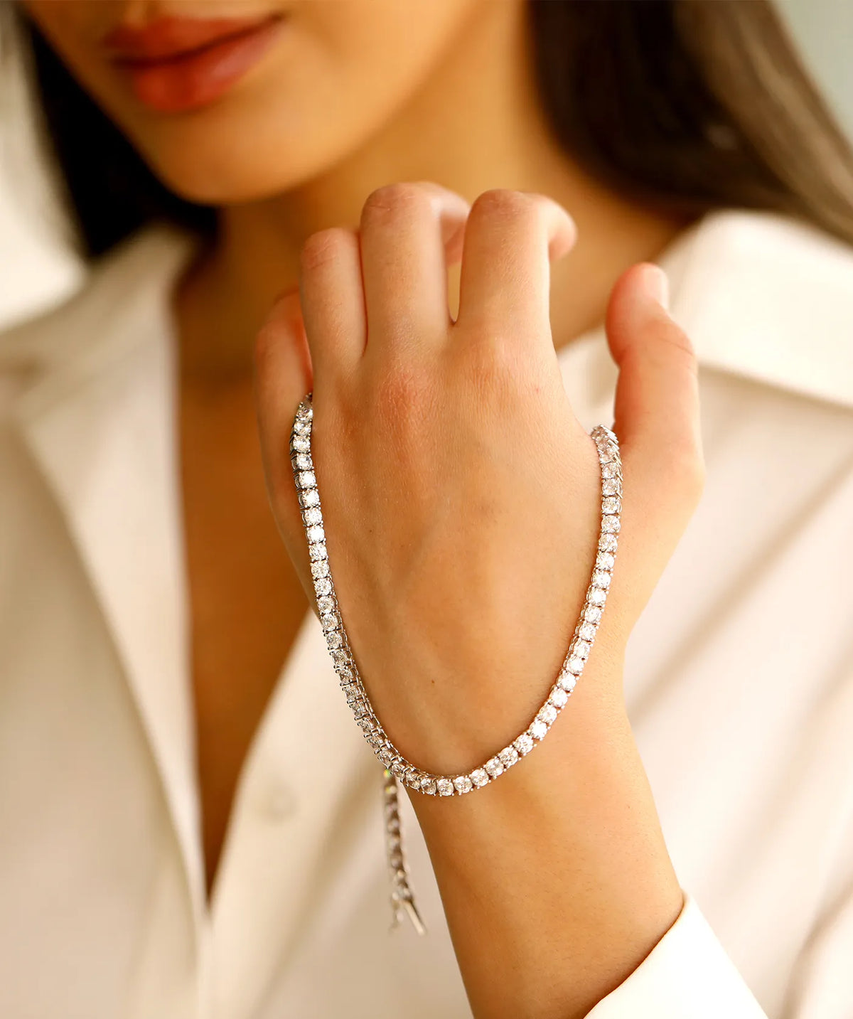 Model wearing the Tennis Necklace around the neck