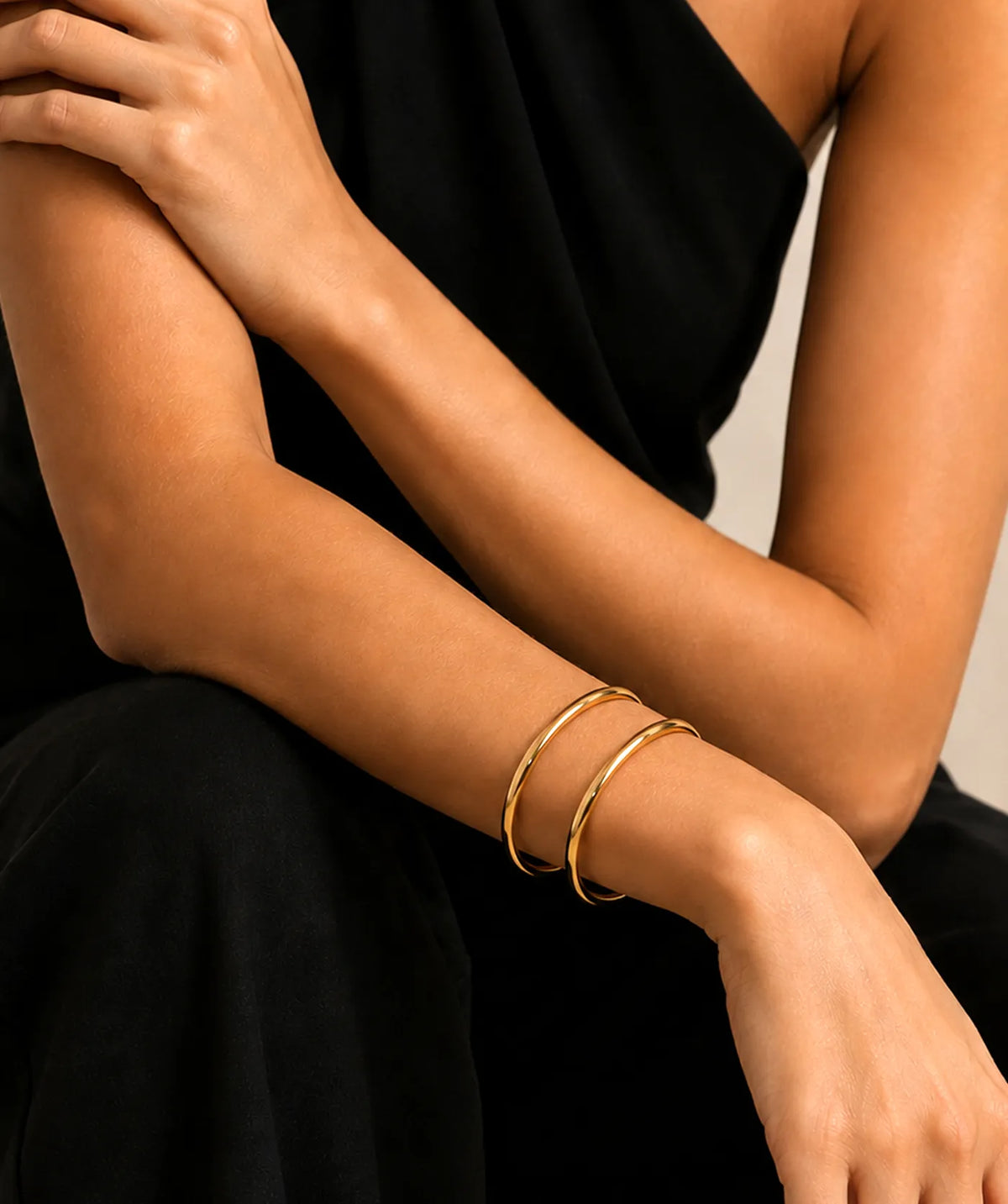 Model wearing the Gold Thin Plain Bangle on the wrist
